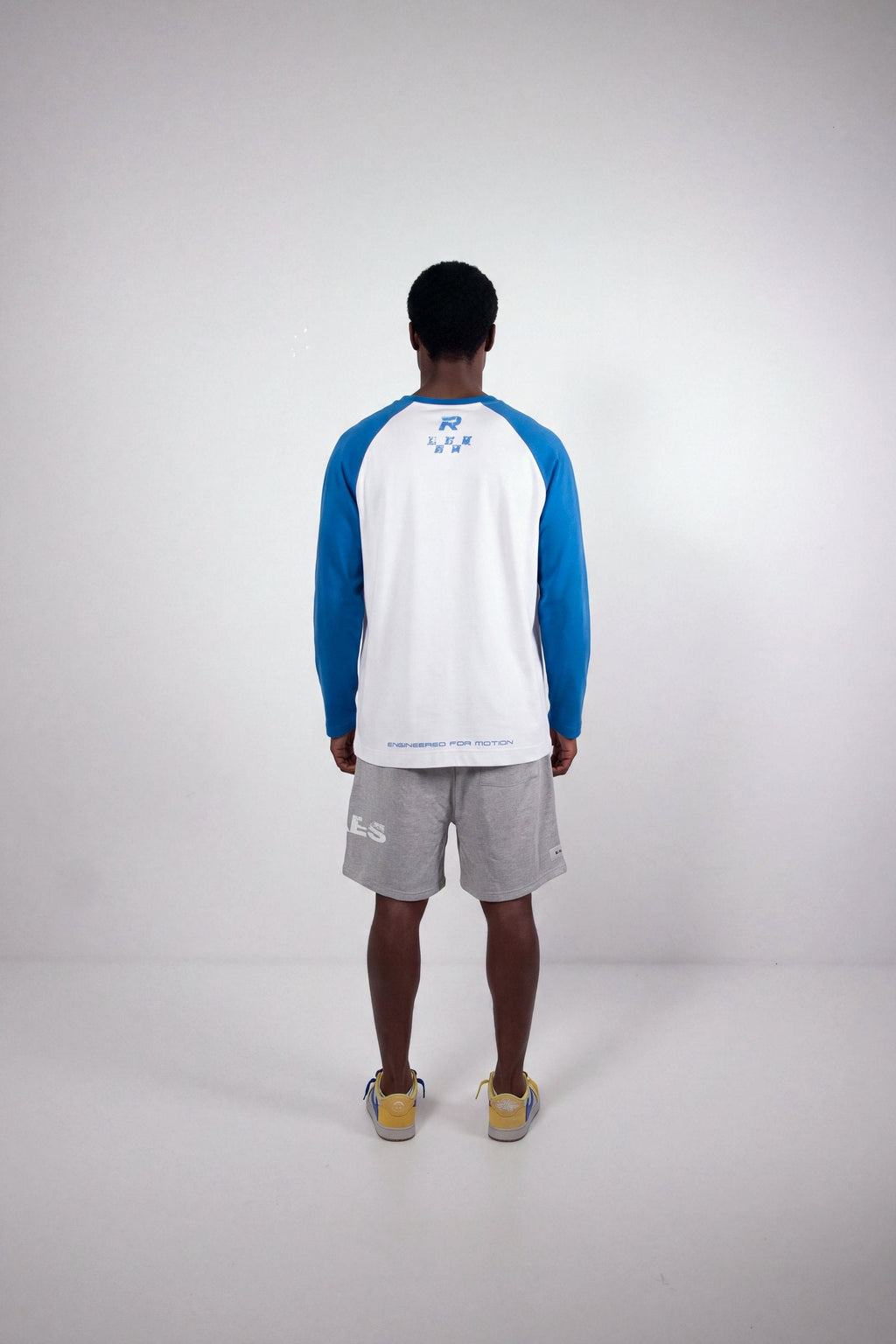 RHAES 1995 Raglan Long Sleeve — back with Engineered for Motion hem print, full body