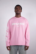 Model wearing RHAES 22 Long Sleeve in Soft Pink — distressed RHAES chest print