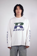 Model wearing RHAES Racing Long Sleeve in White — racing R chest print, front view